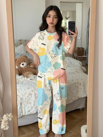 SHEIN طقم بنطلون ولباس علوي للمراهقات بطبعة زهور ودبدوب، رقبة دائرية وأكمام قصيرة، مناسب للربيع والصيف