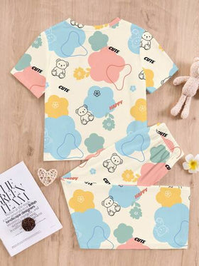 SHEIN طقم بنطلون ولباس علوي للمراهقات بطبعة زهور ودبدوب، رقبة دائرية وأكمام قصيرة، مناسب للربيع والصيف