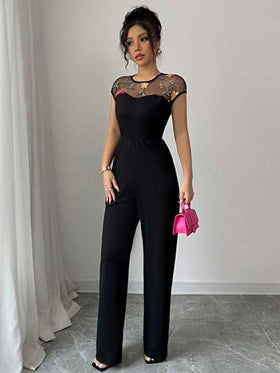 SHEIN PETITE جمبسوت سيدات عملية وأنيقة بسروال بنطلون, بدون أشرطة وبياقة مستديرة, مزينة بتطريز زهري ملون, من خامة سوداء, مناسبة للربيع والصيف
