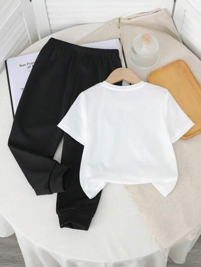 SHEIN طقم ملابس أطفال ذكور كاجوال بتصميم كرتوني مطبوع برسومات وحوش وحروف، قصير الأكمام وبنطلون، للخريف