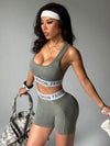 SHEIN Sport Studio طقم ملابس رياضية للنساء من البرزنت مكون من كابوت وشورت