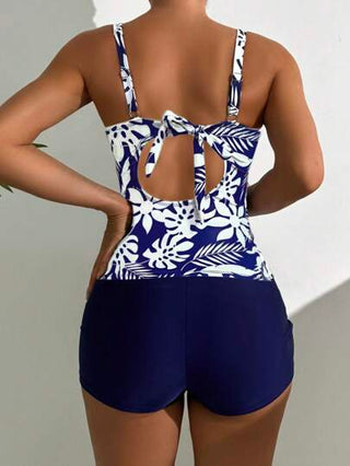 طقم تانكيني حريمي Swim Lushoire مجموعتان من البكيني المحتشم بتصميم منساب، ملبوس رفع وتثبيت وتنفيذ بسلك داخلي مزين بطبعة نباتات استوائية بلونين الأزرق والأبيض، مناسب للنساء البالغات المحافظات في الإجازات، تشمل السترة والسراويل الداخلية