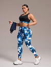 SHEIN Sport Studio مجموعة رياضية قياس كبير قطعتين تشمل: توب بلا أكمام ذو لون واحد وسروال ضيق بطباعة صبغ التعادل