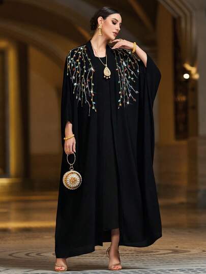 Al Najma رمضان عباءة نسائية أنيقة طويلة الأكمام فضفاضة، نمط نباتي مرصع بالراين، أناقة عربية