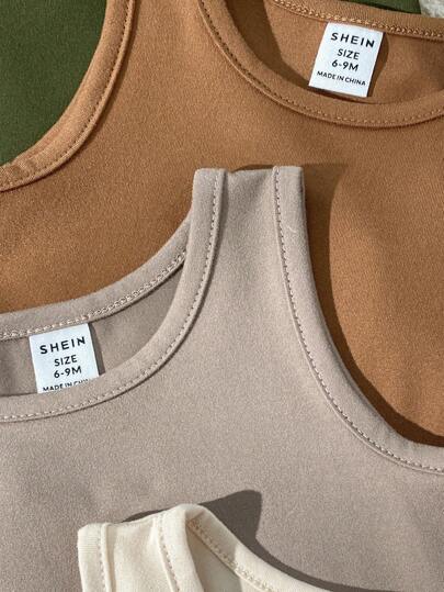 SHEIN Vintaside Kids 10 قطعة مجموعة ملابس صيفية للأطفال الرضع الجنسين، تتكون من بلوزات بياقة دائرية باللون الأسود والأبيض والرمادي والأزرق والأخضر الرمادي مع شورتات فضفاضة مطابقة، بتصميم بسيط، مناسبة للعب في الخارج والارتداء اليومي للأطفال الرضع