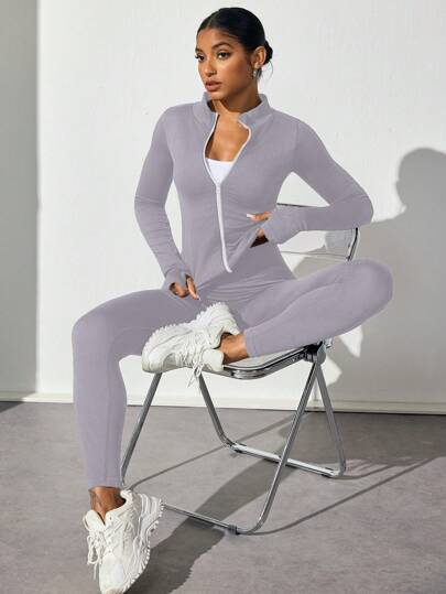 SHEIN Sport Studio طقم رياضي للنساء من بنطلون وبلوزة طويلة الأكمام مطابقة اللون وذات سحاب