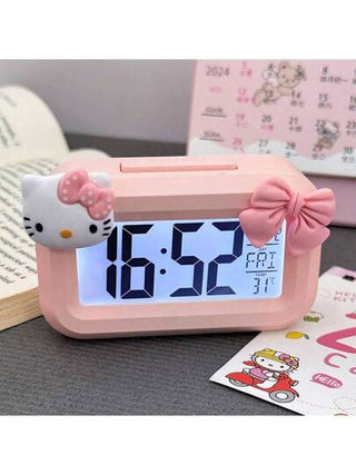 Sanrio ساعة منبه صغيرة هالو كيتي من سانريو - ساعة طاولة صغيرة بتصميم كيوت متعددة الوظائف محمولة للطلاب و ديكور المنزل | منتج رسمي معتمد ديكور غرفة ساعة رقمية