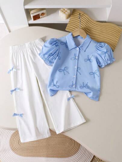 SHEIN Genkimix Kids قطعتان / مجموعة قميص أكمام قصيرة منتفخة مطبوع عليه فيونكة وبنطلون للفتيات الصغار