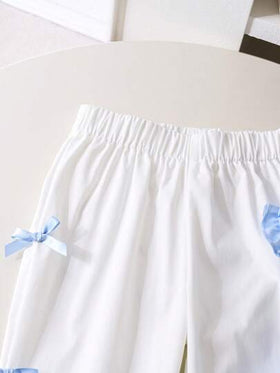 SHEIN Genkimix Kids قطعتان / مجموعة قميص أكمام قصيرة منتفخة مطبوع عليه فيونكة وبنطلون للفتيات الصغار