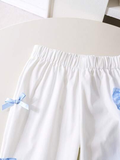 SHEIN Genkimix Kids قطعتان / مجموعة قميص أكمام قصيرة منتفخة مطبوع عليه فيونكة وبنطلون للفتيات الصغار