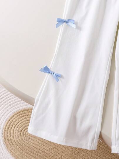 SHEIN Genkimix Kids قطعتان / مجموعة قميص أكمام قصيرة منتفخة مطبوع عليه فيونكة وبنطلون للفتيات الصغار