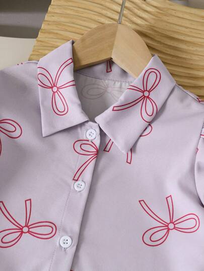 SHEIN Genkimix Kids طقم من 2 قطعة، بلوزة كم قصير منتفخ ذات طبعة فيونكة مع بنطال، مناسب للفتيات الصغيرات