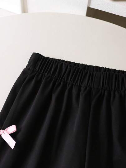 SHEIN Genkimix Kids طقم من 2 قطعة، بلوزة كم قصير منتفخ ذات طبعة فيونكة مع بنطال، مناسب للفتيات الصغيرات