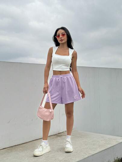 EZwear شورت رياضي وردي فاتح مرن بخصر رباط لربيع وصيف واسع وشكل عفوي بتفاصيل ملحقة