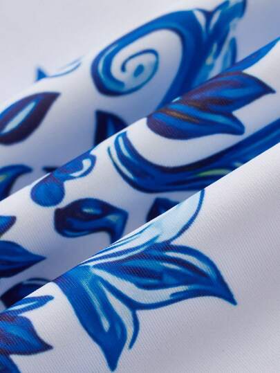Swim Oasis سباحة/صيف للنساء موديل SS2025 ملابس شاطئ، بدلة سباحة، طبعة خزف أزرق وأبيض، بقطعة واحدة + تنورة قصيرة لتغطية