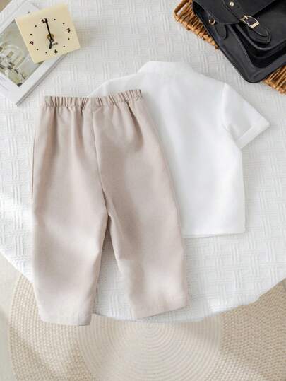 SHEIN طقم قميص كاجوال بياقة بيضاء وبنطال بخصر مطاطي مناسب للمناسبات والحفلات، ملابس للأطفال من الجنسين المناسبة لحفلات أعياد الميلاد والمناسبات المسائية والمناسبات الخاصة كحفلة القمر الكامل أو عيد الميلاد الأول