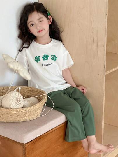 Dazy Kids ملابس فتاة صغيرة للخريف: بلوزة تي شيرت بياقة مستديرة وأكمام قصيرة مطبوعة + بنطلون صوفي أحادي اللون، طقم منزلي للربيع/الصيف رمضان