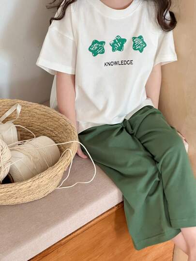 Dazy Kids ملابس فتاة صغيرة للخريف: بلوزة تي شيرت بياقة مستديرة وأكمام قصيرة مطبوعة + بنطلون صوفي أحادي اللون، طقم منزلي للربيع/الصيف رمضان