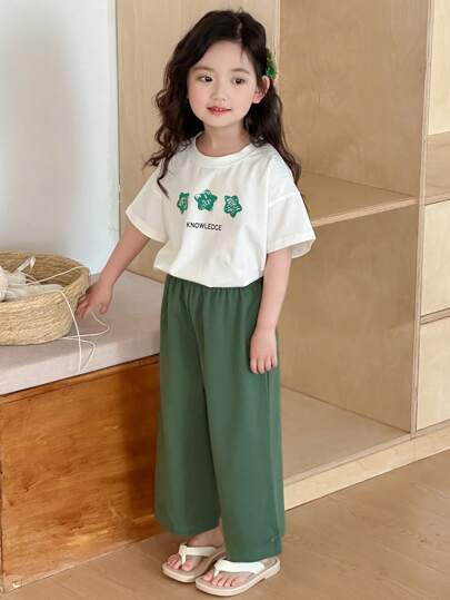 Dazy Kids ملابس فتاة صغيرة للخريف: بلوزة تي شيرت بياقة مستديرة وأكمام قصيرة مطبوعة + بنطلون صوفي أحادي اللون، طقم منزلي للربيع/الصيف رمضان