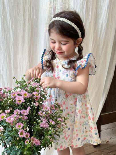 فساتين بيبي فستان صيفي قصير بأكمام كاب وطبعة زهور مع تصميم جذاب ومناسب للأطفال