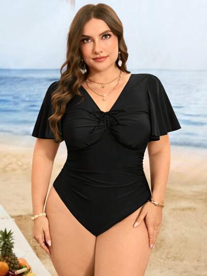 Swim Lushoire بدلة سباحة نسائية بحجم كبير ذات لون أحادي، تصميم كشكش علي الأكمام، وسحاب في منطقة الصدر لتغطية البطن، مناسبة للصيف