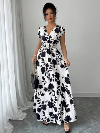 فساتين حريمي Tall فستان أنيق متوسط الطول بطبعة زهور وطيات على شكل X بياقة على شكل حرف V، بلون المشمش