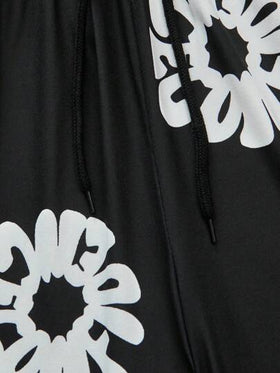 SHEIN شورت أسود فضفاض مطبوع للمراهقين (الأولاد)