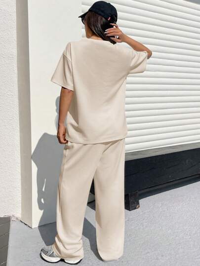 SHEIN EZwear طقم بنطلون وتي شيرت كاجوال فضفاض بنسيج معتبر من لون المشمش للنساء
