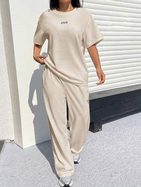 SHEIN EZwear طقم بنطلون وتي شيرت كاجوال فضفاض بنسيج معتبر من لون المشمش للنساء