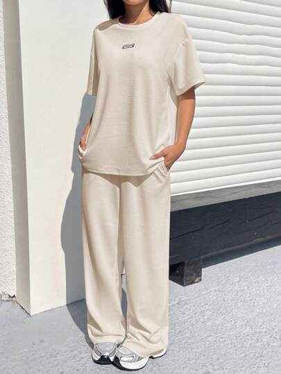 SHEIN EZwear طقم بنطلون وتي شيرت كاجوال فضفاض بنسيج معتبر من لون المشمش للنساء