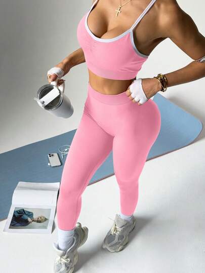 Sport Studio بذلة رياضية للنساء مكونة من ملابس علوية بدون ظهر وبذيل على شكل حرف V مع ليغنز