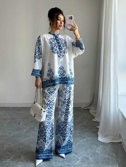طقم حريمي قطعتين Elenzga مجموعة بلوزة بطباعة زهور نسائية بأكمام 3/4 وبنطلون نسائي مطبوع مع خصر مرن، قطعة واحدة
