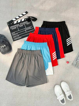 SHEIN Explorewe شورتات أولادي فضفاضة بلون أحادي عصرية، مناسبة للصيف
