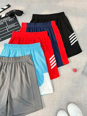 SHEIN Explorewe شورتات أولادي فضفاضة بلون أحادي عصرية، مناسبة للصيف
