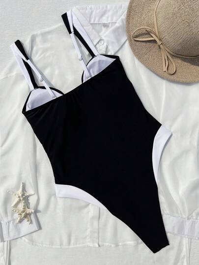بدلة سباحة قطعة واحدة للنساء بتصميم قصير ظهر مكشوف وكشكشة بدون أكمام باللونين الأسود والأبيض، بدلة سباحة جذابة لارتداء على الشاطئ أو في العطلات