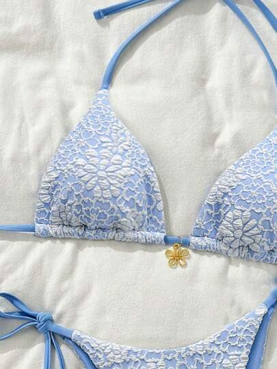 Swim Basics زي سباحة مكون من 2 قطعة مكون من فوطة ذات نقشة زهرية ، صدرية فوق تحمل بزخرفة زهرة ذهبية وسراويل سباحة جانب مربوط ،للإجازة الربيعية