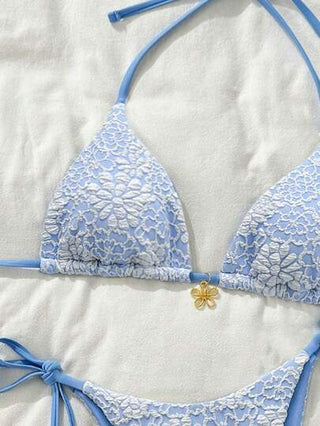Swim Basics زي سباحة مكون من 2 قطعة مكون من فوطة ذات نقشة زهرية ، صدرية فوق تحمل بزخرفة زهرة ذهبية وسراويل سباحة جانب مربوط ،للإجازة الربيعية
