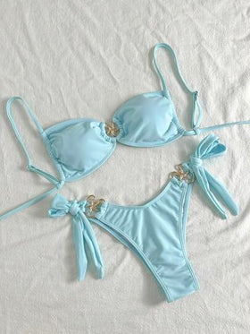 Swim Mod بدلة سباحة ذات رابطة جانبية مزينة بنجمة البحر المعدنية باللون الأحادي للنساء