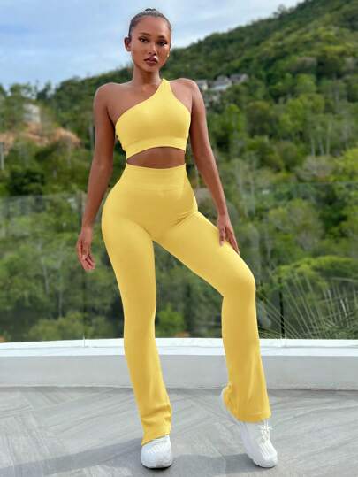 SHEIN Sport Studio بدلة رياضية للنساء تتكون من ملابس علوية بدون أكمام عنق غير متماثل لون واحد وبنطلون طويل ذات طابع بسيط