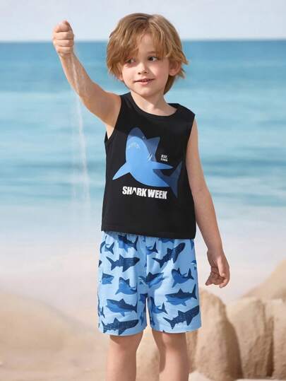 مايوه أولادي Shark Week X  طقم قصير كارتوني للأولاد مكون من ملابس علوية أكمام عليه طباعة سمكة قرش أسود وشورت أزرق بحري قطعتين