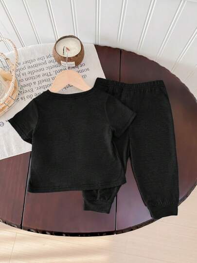 SHEIN طقم قطني ناعم للأطفال الرضع بنطال خصر مطاطي وبلوزة كم قصير قطعتان، ملابس كاجوال مناسبة للخروج في الربيع والصيف، للمدرسة والمنزل