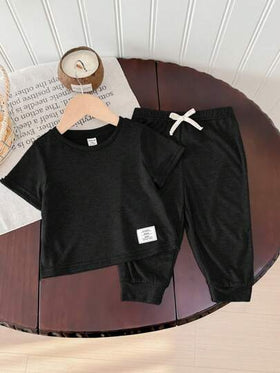 SHEIN طقم قطني ناعم للأطفال الرضع بنطال خصر مطاطي وبلوزة كم قصير قطعتان، ملابس كاجوال مناسبة للخروج في الربيع والصيف، للمدرسة والمنزل