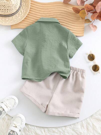 SHEIN 2 قطعة/مجموعة قميص بأكمام قصيرة لون أساسي وشورت بخصر مطاطي للأطفال الذكور والإناث، مناسب للارتداء في الصيف للبقاء في المنزل أو الخروج أو السفر والعطلات