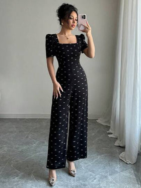 Modelyn وصلة طويلة أنيقة للسيدات، بفتحة عميقة على الظهر وياقة V، بأكمام بالون قصيرة مع طبعة الفيونكة