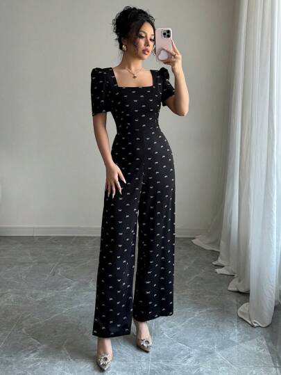 Modelyn وصلة طويلة أنيقة للسيدات، بفتحة عميقة على الظهر وياقة V، بأكمام بالون قصيرة مع طبعة الفيونكة