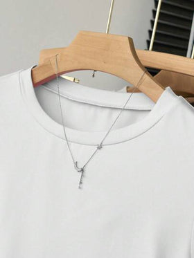 SHEIN Explorewe 5 قطع طقم قمصان قصيرة الأكمام بخصر ضيق لون واحد أساسي للبنات المراهقات