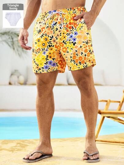Manfinity Swimmode شورت رجالي بطبعات زهور على الجيب وسحاب الخصر، مناسب للصيف