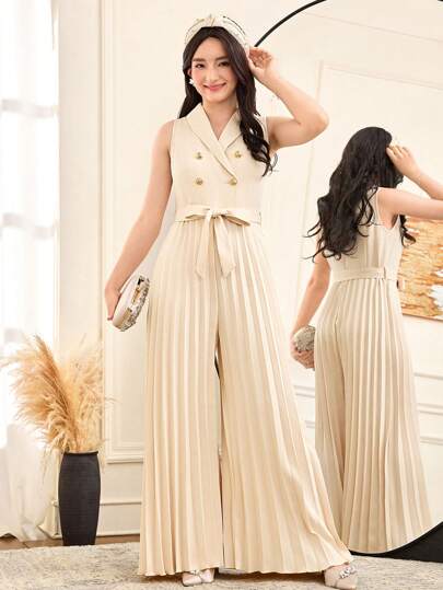 SHEIN جمبسوت شابات أنيقة لون المشمش مع طوقٍ منحنٍ، بطول واسع، تصميم مبتسر من طيات لتثبيت الخصر على شكل ثنيات، مناسبة للمناسبات مثل العطلات والحفلات والأعراس والعودة إلى المدرسة والتخرج