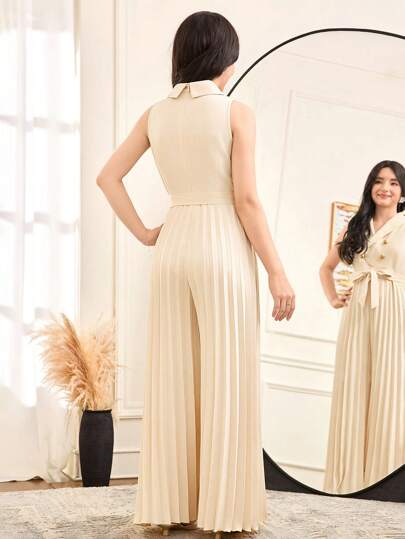 SHEIN جمبسوت شابات أنيقة لون المشمش مع طوقٍ منحنٍ، بطول واسع، تصميم مبتسر من طيات لتثبيت الخصر على شكل ثنيات، مناسبة للمناسبات مثل العطلات والحفلات والأعراس والعودة إلى المدرسة والتخرج