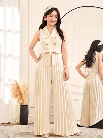 SHEIN جمبسوت شابات أنيقة لون المشمش مع طوقٍ منحنٍ، بطول واسع، تصميم مبتسر من طيات لتثبيت الخصر على شكل ثنيات، مناسبة للمناسبات مثل العطلات والحفلات والأعراس والعودة إلى المدرسة والتخرج